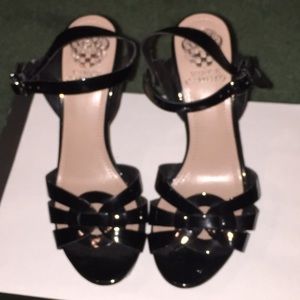 Vince Camino black patent leather heels.